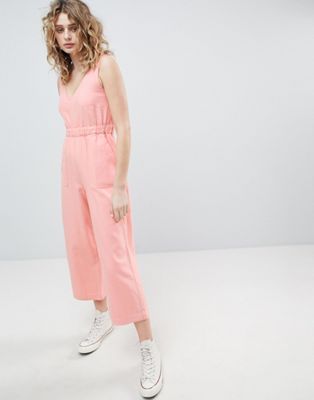 DESIGN denim jumpsuit with v neck in washed pink