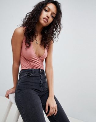 DESIGN sleeveless body with wrap front in rust