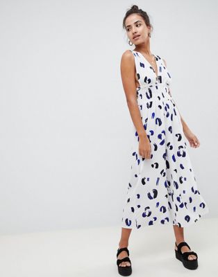 DESIGN ruched waist plunge jumpsuit in brush stroke print